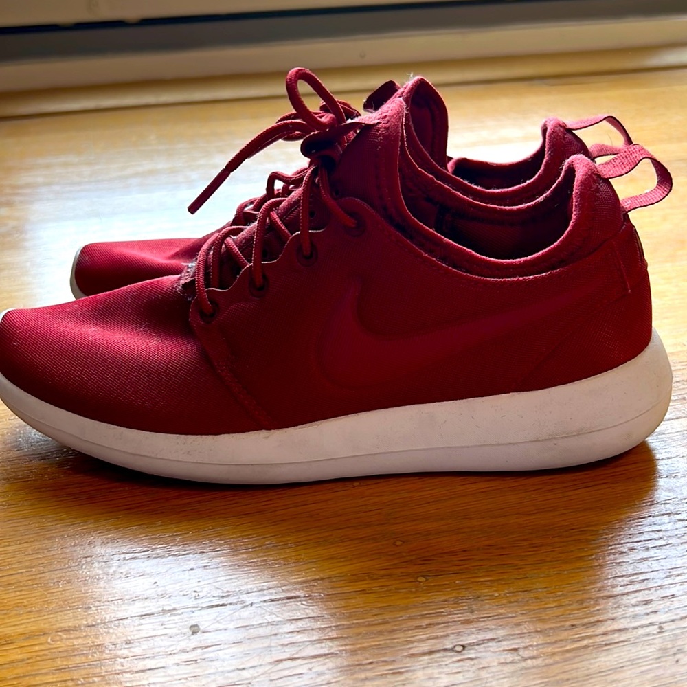 NIKE. Women’s 7.5. Dark red